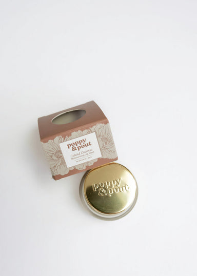 Gold container with 'Poppy & Pure' branding on a white background