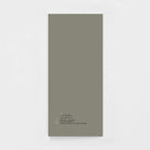 Minimalist taupe greeting card back with small iCare Greetings logo and text on white background.