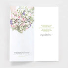 Bridal shower greeting card with pink and purple bouquet and congratulatory message