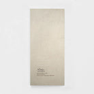 Back of a minimalist masculine birthday greeting card on neutral background