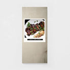 Masculine birthday greeting card with grilled ribs and herbs on a minimalist, neutral background.