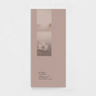 Minimalist sympathy greeting card with a single white flower on mauve background, Salt and Honey
