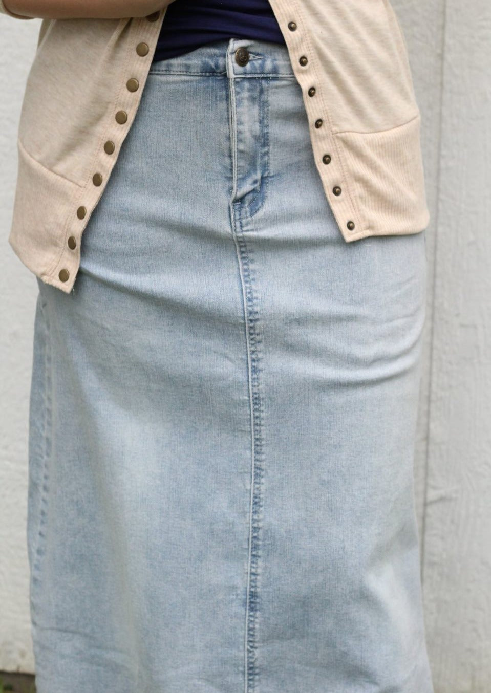 Long straight denim skirt in light wash with distressed/frayed ends
