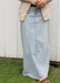 Long straight denim skirt in light wash with distressed/frayed ends